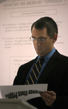Darin White, professor of marketing, goes over a project on strategy during one of his classes in the school of business. - Photo by Heather Phillips
