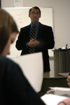 Darin White, professor of marketing, leads a class in the school of business. - Photo by Heather Phillips
