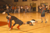 Micah Moyers (right) tries to kill Patrick Myers(left) during the crazy fan performances at Midnight Madness. - Photo by Jim Veneman