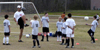 4/4/06 - Chris Lean, physical education major, coaches the Jackson Wolves 95 in preparation for the National Championship Games. - Stephanny Rodriguez