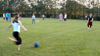 Graduating seniors play a game of kickball at President Dockery's house during Happy Trails, a farewell event sponsored by Young Alums. - Photo by Brad Moore