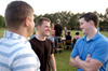 Seniors Brandt Waggoner, Eric Smith, and Paul Akin spend time together at President Dockery's house during Happy Trails, a farewell event for graduating seniors sponsored by Young Alums. - Photo by Brad Moore