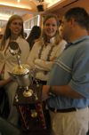 Brandon Boylan, associate director of wellness, talks with Amber Lutz & Katie Tipton about the Independent Women's intramural cup win after the Awards Day ceremony. - Photo by Heather Phillips
