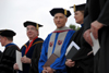 05/20/06 - Commencement speaker Paul Corts (center), talks with Union Provost Carla Sanderson (right) and President David S. Dockery prior to the start of graduation ceremonies. Corts had been announced as the new president of the Council for Christian Colleges and Universities a few weeks prior to the event.