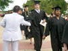 Associate Vice President for University Relations and Alumni Services Gary Williams greets the newest Union graduates of May 2006. - Photo by Stephanie Schroeder