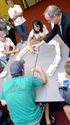 08/29/05 - President Dockery officiates an intense game of spoon hockey between Lydia Livingston & Douglas Martin during the Ice Cream Social at New Student Orientation.