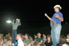 UBuzz hosts Kyle Raines and Pepper Sidhom send out a big howdy at the annual Howdy Party. - Photo by Brad Moore