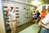 07/23/02 - A group of students who took the environmental ethics class offered this summer at Union look at the inner workings of a local power plant.
