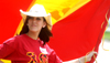 Rebecca Wiggins flies the Chi Omega colors during a Make-A-Wish fund raiser. - Photo by Kristen Nicole Sayres