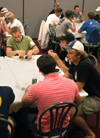 Nate Crew, Kelly Reid and Brett Jenkins enjoy a meal together during rush week with the men of Sigma Alpha Epsilon.  - Photo by Brad Moore
