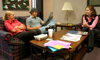 11/1/05 - Megan Malone, Jacob Malone and Annie Ross hang out in the campus ministries suite. - Brad Moore