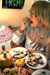 11/2/05 - Sophomore Ruth Chao eats at a festive Halloween dorm room party.