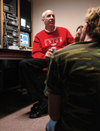 Steve Beverly, associate professor of communication arts, teaches his television production class. - Photo by Brad Moore