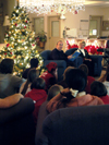 12/13/05 - President Dockery reads the Christmas story in McAfee Commons along with his wife Lanese.