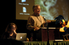 Alum Kathleen Murray assists Jim Veneman, instructor of communication arts and director of visual communications, with his presentation at the Southwestern Photojournalism Conference in Ft. Worth, Texas. - Photo by Stephanny Rodriguez