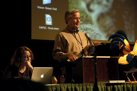Alum Kathleen Murray assists Jim Veneman, instructor of communication arts and director of visual communications, with his presentation at the Southwestern Photojournalism Conference in Ft. Worth, Texas.