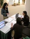 Freshman Stephanny Rodriguez signs up for a <em>two-minute show,</em> an opportunity for conference attendees to show off some of their work, at the Southwestern Photojournalism Conference in Fort Worth, Texas. - Photo by Kristen Nicole Sayres
