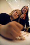 Juniors Candace Todd and Laura Dancy enjoy being able to color on the table during Mochafee, an annual student event in the McAfee commons. - Photo by Kristen Nicole Sayres