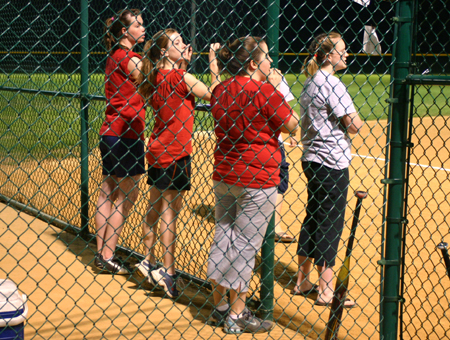 Emily Blacketter, Alaina Bare, Courtney Ford and Dana Thompson watch the action on intramurals softball field.