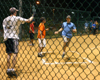 David Roach waves in Drew Zimmer during an intramural softball game. - Photo by Stephanny Rodriguez
