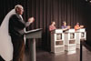 10/31/02 - Assignment: <i>Head to Head</i> - Assistant Professor of Communication Arts and host of <i>Head to Head</i>, Steve Beverly applauds a winning contestant.
