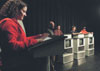 Assignment: <i>Head to Head</i> - Sophomore Ashley Mitchell poses a number of trivia quetions to each contestant. - Photo by Kristen Hiller