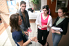 Gina Orosz talks with Andy Robinette, Kristin Schaefer and Katie Beth Kelley about social work on Social Work Awareness Day. - Photo by Kyle Kurlick