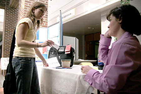 Barbara Reynolds registers for a door prize during Social Work Awareness Day.