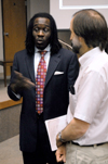 Luther Mercer of the National Institute for Law and Equity speaks with Dr. Hal Poe after the annual Social Justice Symposium. - Photo by Kristen Nicole Sayres