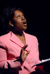 Toshia Cole recites the Maya Angelou poem <em>Phenomenal Woman</em> during Cafe Bongo. - Photo by Kristen Nicole Sayres