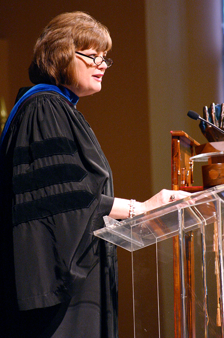 Provost Carla Sanderson reads the names of each award recipient during Awards Day.