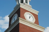 A temporarily-stalled clock on Miller Tower currently reads 12:05 reflecting the time the tornado came through on Saturday night/early Sunday morning. - Photo by Jim Veneman