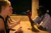 International Student Kennedy Ogwambo shares with Heidi Steinrock and Sarah McBroom his first impressions of coming to the United States and the people and places he misses at his home in Kenya. - Photo by Kyle Kurlick