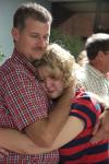 Chris Lutrell says goodbye to his daughter, Freshman Cassie Lutrell, biology major, after the family chapel service. The time after the chapel service is when many families give thier children a last good-bye before going home. For some students, it is their first time to leave home. - Photo by Kyle Kurlick