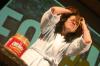 Lindsey Abell applies peanut butter to her hair to jokingly show how well it can be used to quickly fix a bad hairdo during the Focus leader show. - Photo by Stephanie Schroeder