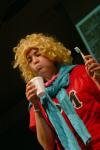 Corrie Rose is the first of several Focus leaders to brush her teeth in the peppermint milkshake skit during the Focus Show. - Photo by Stephanie Schroeder