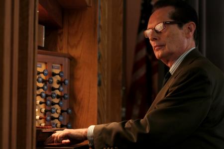 Ronald Boud, professor of music and resident organist, performs for many chapel services.