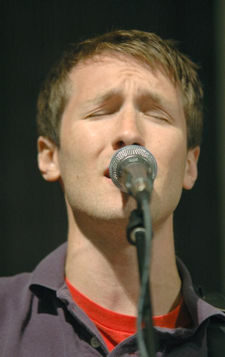 Derek Carson leads worship in a special GO Week chapel.