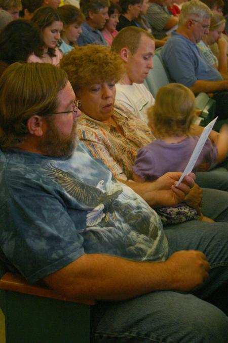 Family members, including the youngest ones, participated in the family chapel service during New Student Orientation by reading a scripture passage together.