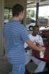 Nathan Williams and Darrion Garret chit chat and enjoy their nice cold drinks with their Focus group at Sonic during New Student Orientation. - Photo by Stephanie Schroeder