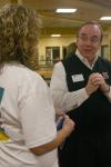 08/28/06 - President Dockery talks to students, like Cassie Lutrell, from Savannah, Tenn., as they exited Coburn after eating a bowl full of ice cream during New Student Orientation.