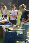 09/8/06 - Jill Brown, Emily Watlington, Emily Hurst and others check out items for sale at a yard sale set up by fellow students in front of McAfee commons. 