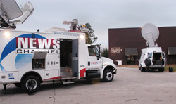 11/11/2002 - Many of the media outlets from Memphis, Nashville and Jackson came to the campus to do live remotes about the tornado damage and the efforts of the Union community to clean it up. (ID: 619)