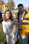 Alums Jeff & Tara Owen show off their future Unionite during the Arts in the Park event at Homecoming. - Photo by Morris Abernathy