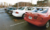 More than 500 cars suffered glass and dent damage when 110 mph winds blew through the McAfee Residence Complex parking lot. - Photo by Kristen Hiller