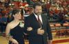 Senior Lindsey Abell, music major, is escorted onto the court by her father just before being crowned Homecoming queen. - Photo by Matthew Diggs