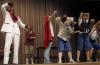 The wolf, played by Andy Morris, attempts to blow down the house of bricks in the Union University Players production <em>The Trial of the Big Bad Wolf</em>. - Photo by Kyle Kurlick