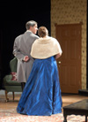 The family butler, Crestwell, played by Jeremy Parker escorts Lindsey Garner as Mrs. Dora Moxton in <i>Relative Values</i>. - Photo by Jim Veneman