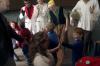 While the audience exits the chapel, the cast of <em>The Trial of the Big Bad Wolf</em> man the exits and thank the children for attending and line up to high five the kids on their way out. - Photo by Kyle Kurlick