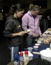 Junior Caitie Maylott, youth ministry major, and Senior Dana Thompson, psychology major, come out for some bagels at the Ode to Bubba's Bagels party in the student lounge. - Photo by Matthew Diggs
